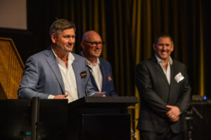 O'Sullivan men making a speech