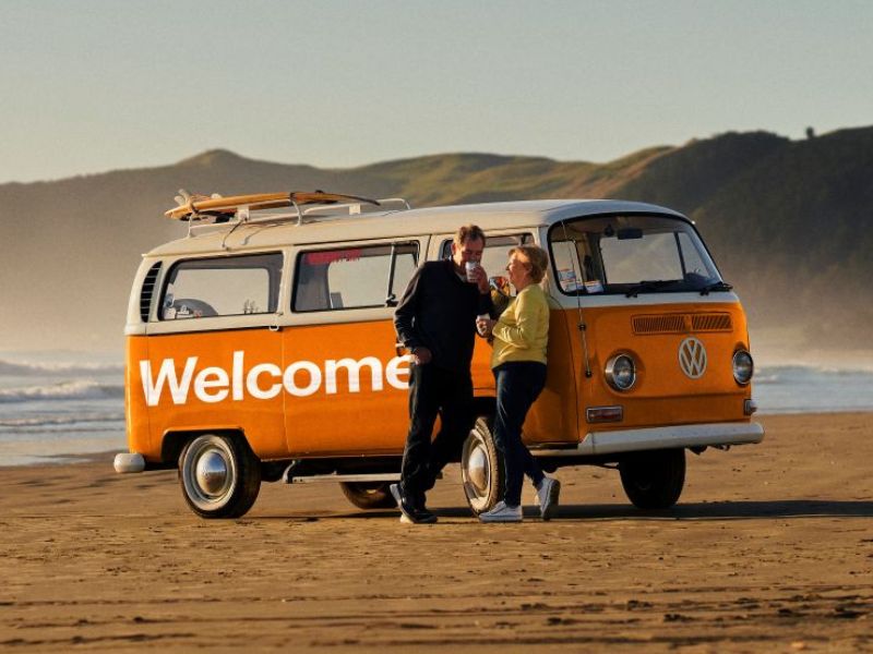 Picture of a Welcome Kombi van on the beach
